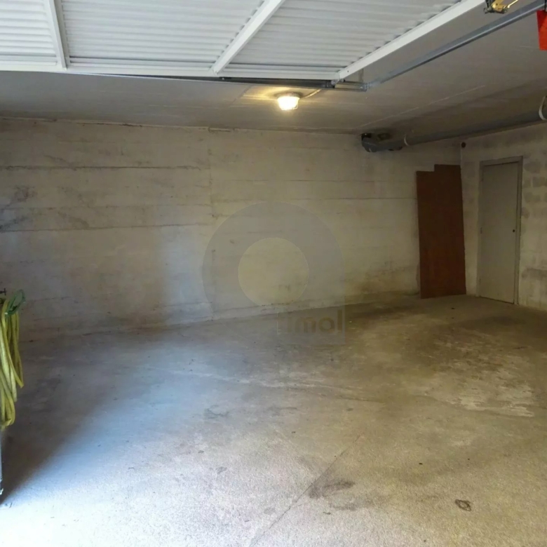 Parking couvert + cave attenante