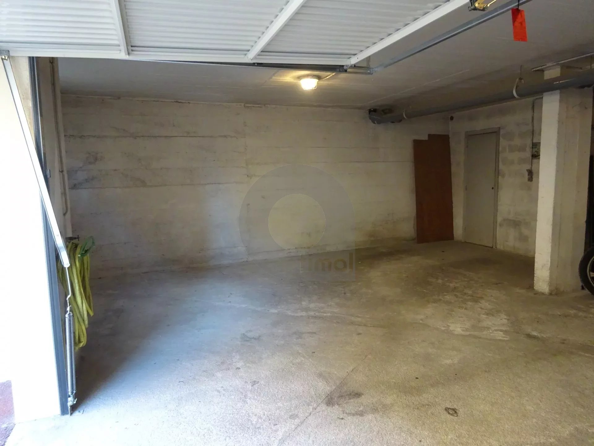 Parking couvert + cave attenante